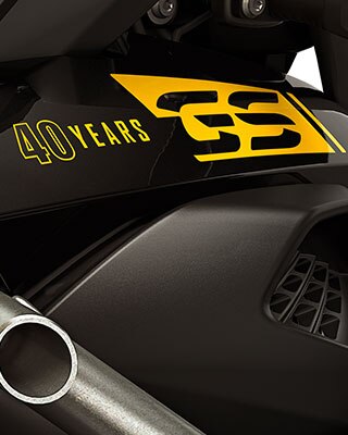 We see a close-up of the 40 Years GS sticker.
