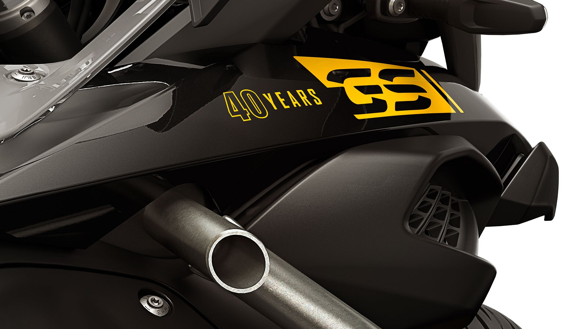 We see a close-up of the 40 Years GS sticker.