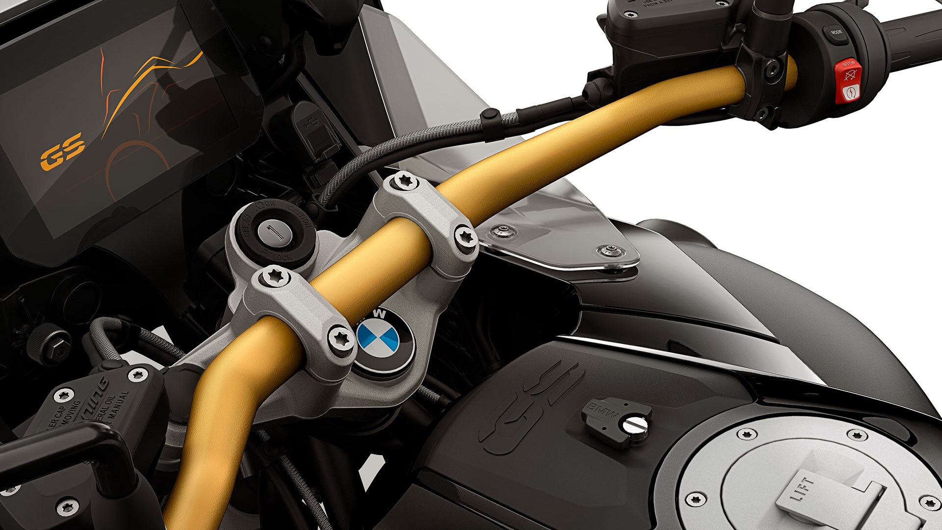 We see the golden handlebars with an integrated storage compartment.