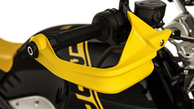 We see the yellow hand protector of the R nineT Urban G/S.